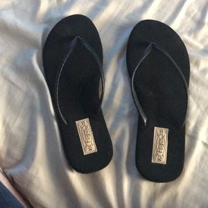 Black flip-flops